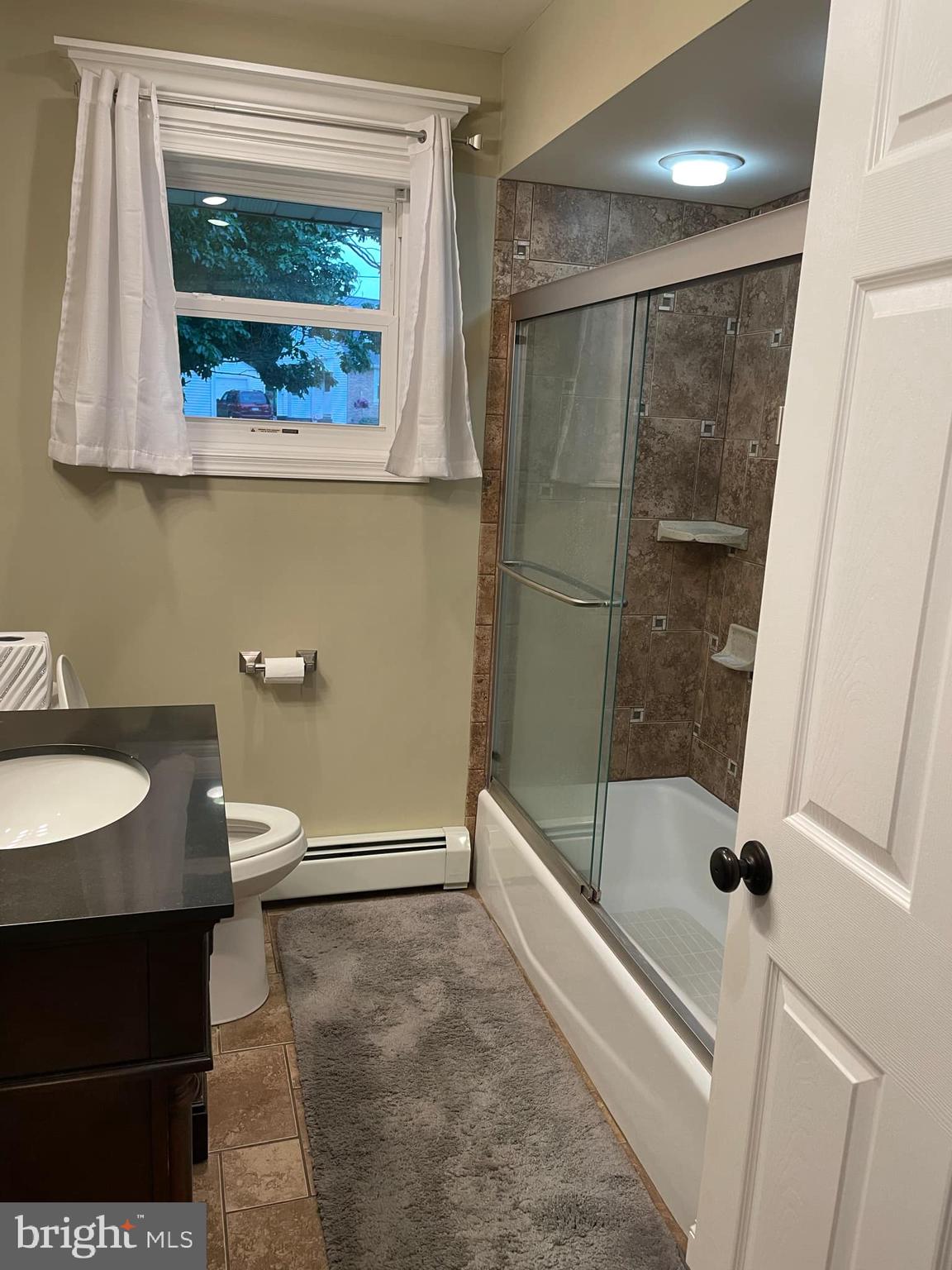 314 Willow Road Hellertown, PA 18055 - Photo 12 of 25 a bathroom with a sink and a mirror