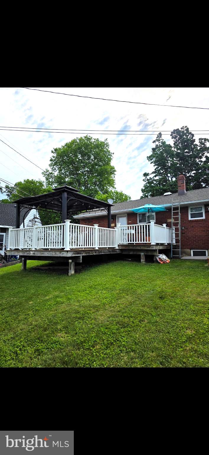 314 Willow Road Hellertown, PA 18055 - Photo 2 of 25 a view of a swimming pool with a garden