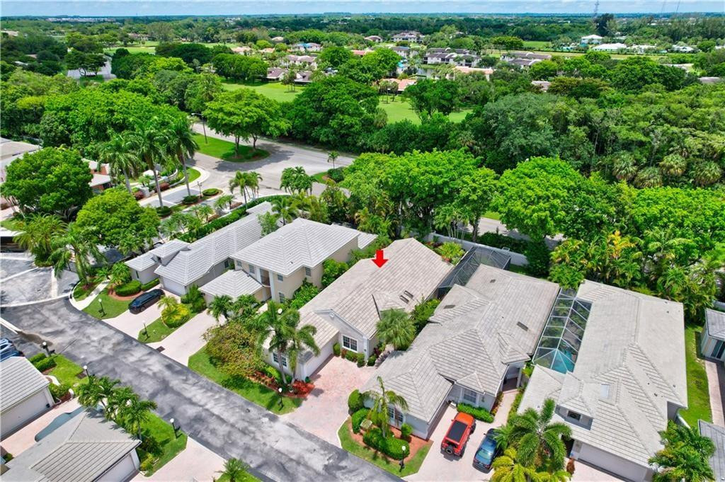 8171 Hampton Wood Drive Boca Raton, FL 33433 - Photo 35 of 56 an aerial view of a house with a yard