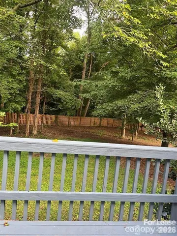 a view of a wooden fence