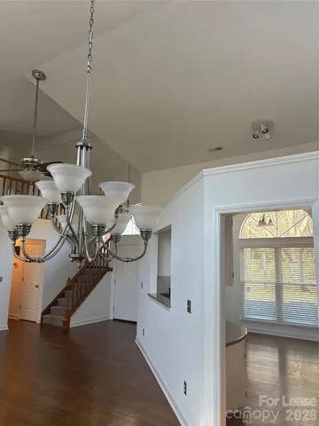 a view of a living room and hardwood floor