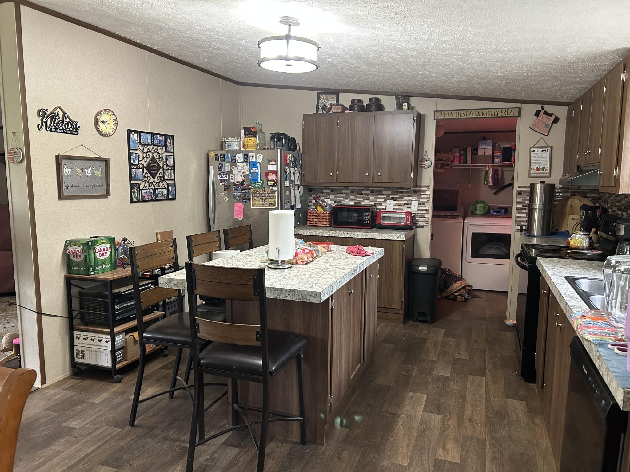 145 Pinhook Road Calhoun, TN 37309 - Photo 8 of 30 a kitchen with a dining table and chairs