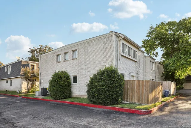 a front view of a house with a garage