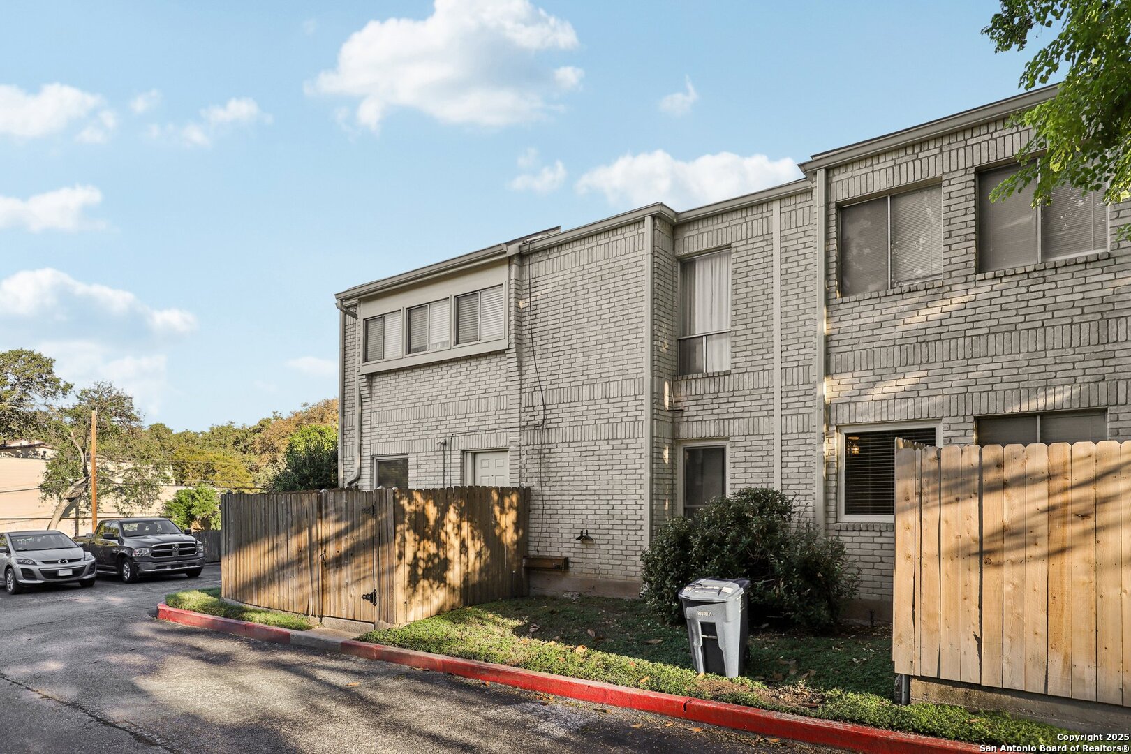 3441 Turtle Village Drive, Unit 92FF San Antonio, TX 78230 - Photo 33 of 34 a view of a street with cars