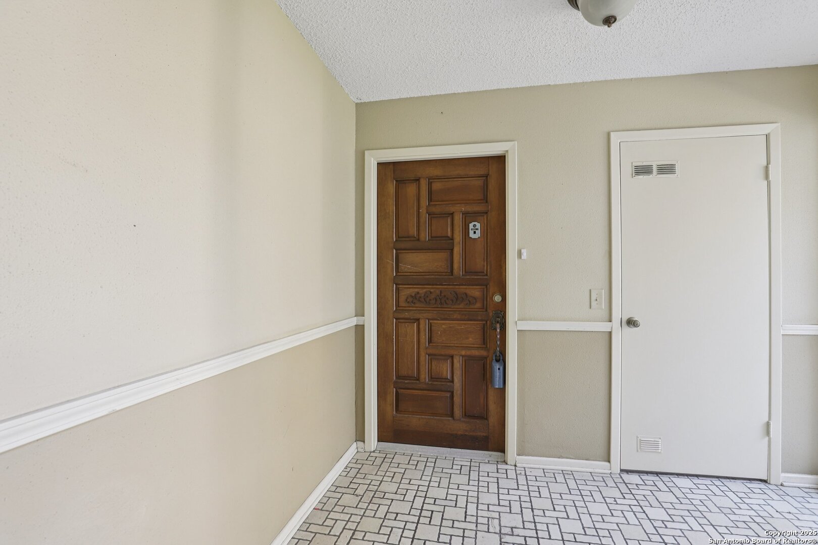 3441 Turtle Village Drive, Unit 92FF San Antonio, TX 78230 - Photo 5 of 34 a view of a closet area with rug