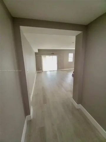 a view of hallway with window