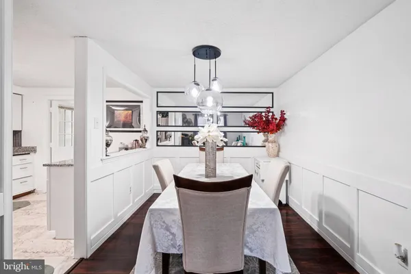 a kitchen with a stove microwave and sink