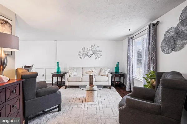 a living room with furniture and a couch