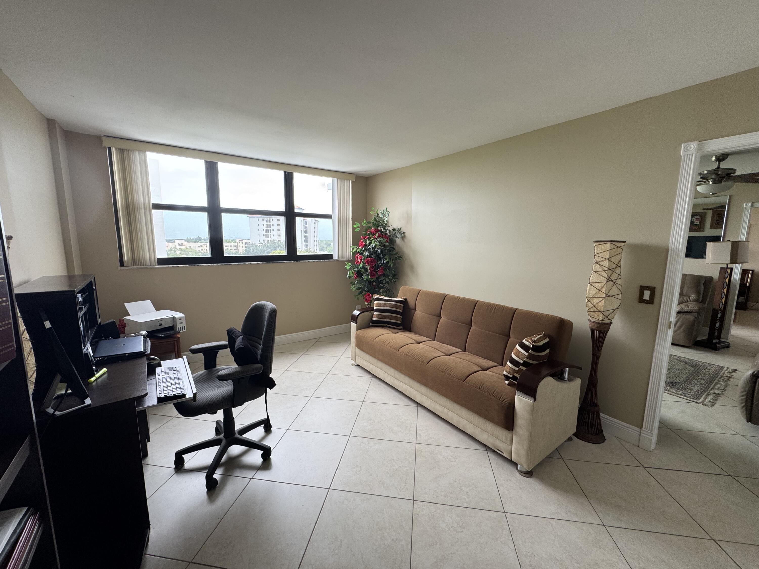 336 Golfview Road, Unit 706 North Palm Beach, FL 33408 - Photo 21 of 41 a work room with furniture and a window