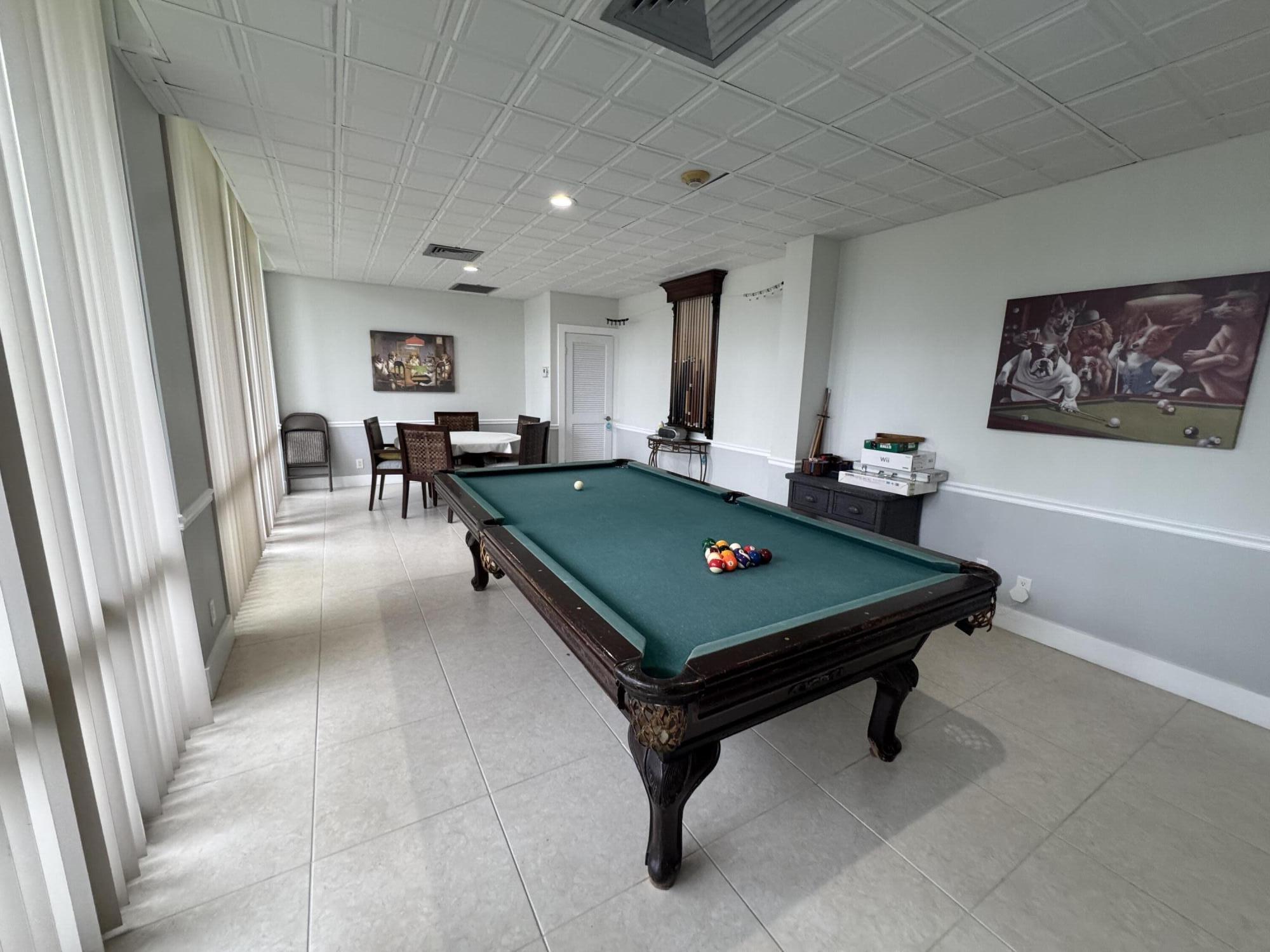 336 Golfview Road, Unit 706 North Palm Beach, FL 33408 - Photo 28 of 41 a room with pool table and windows