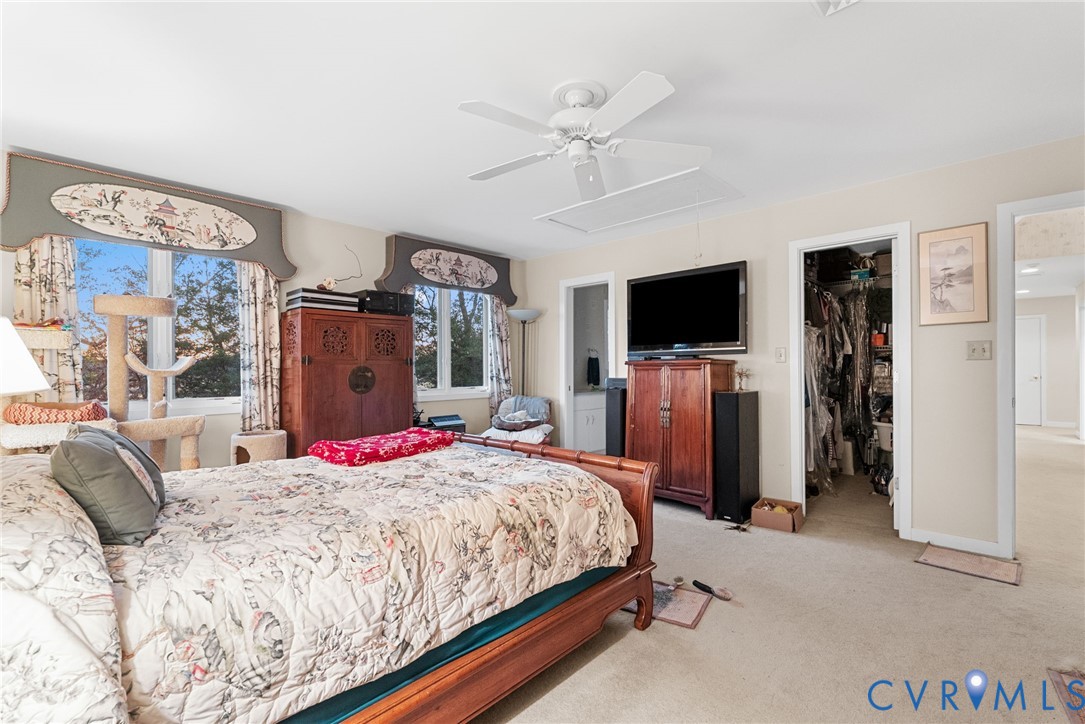 276 Colony Trail Lanexa, VA 23089 - Photo 39 of 43 Carpeted bedroom with attic access, a spacious clo
