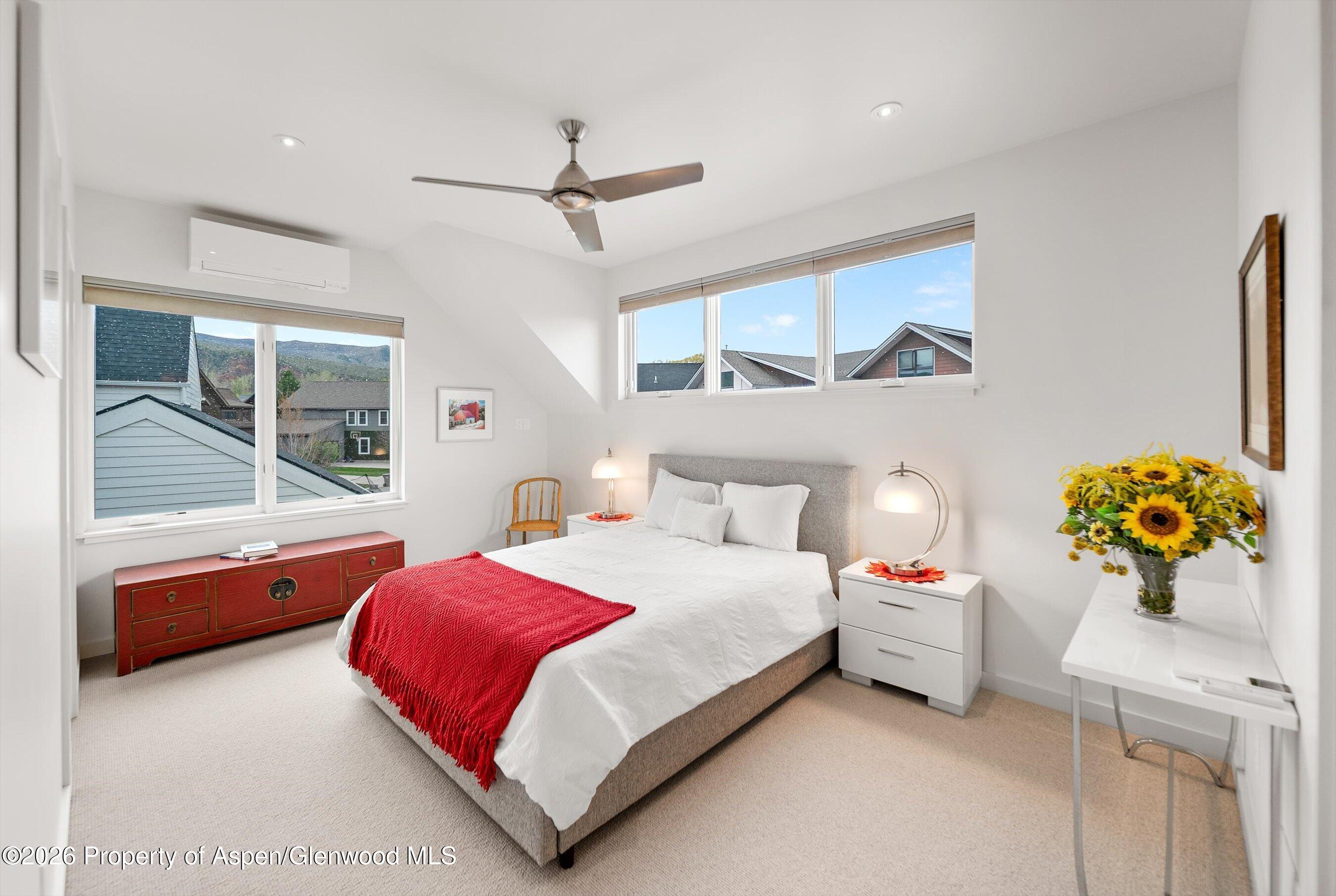 350 Sopris Circle Basalt, CO 81621 - Photo 19 of 49 a bedroom with a bed and window