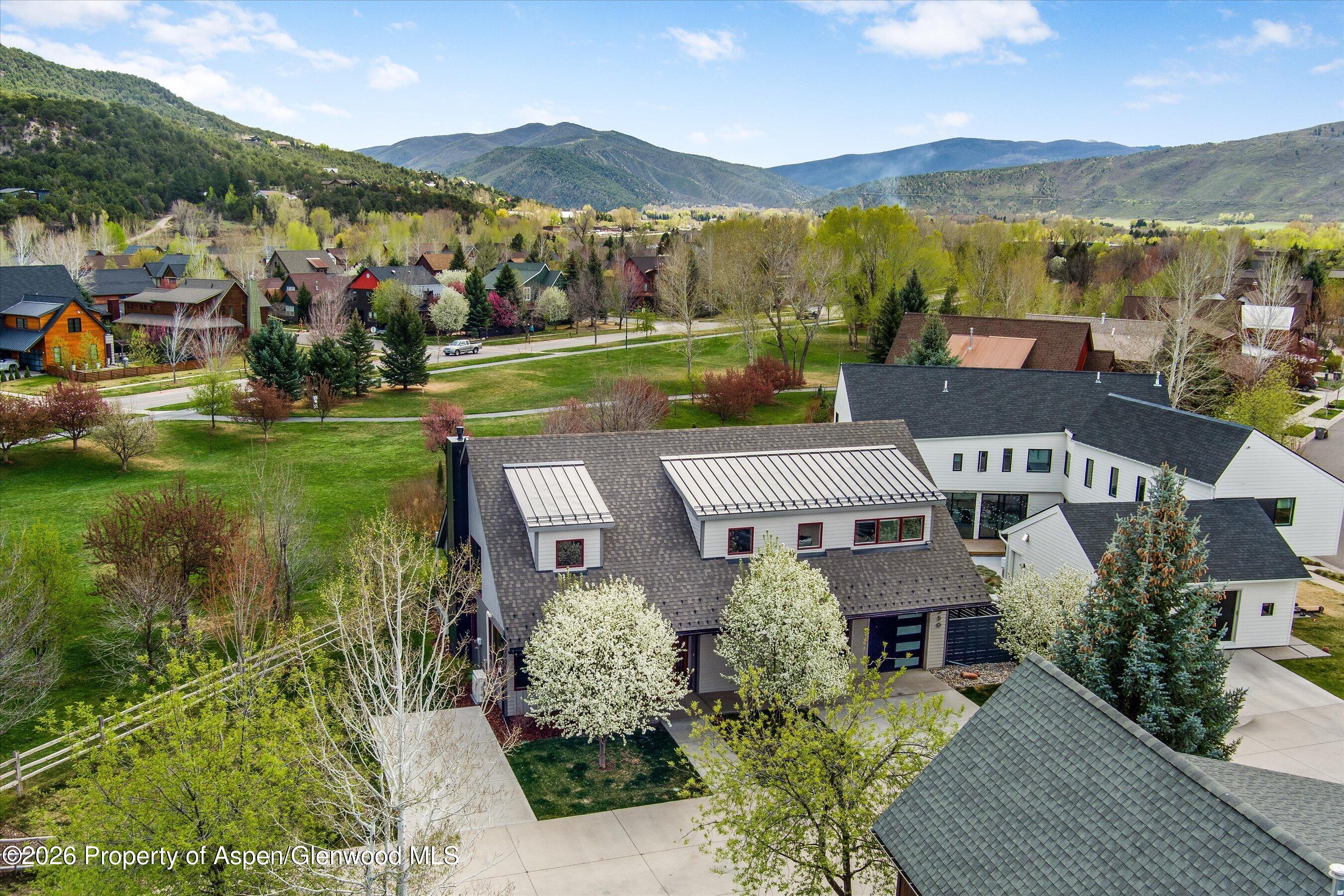 350 Sopris Circle Basalt, CO 81621 - Photo 33 of 49 an aerial view of a house with a garden and lake view