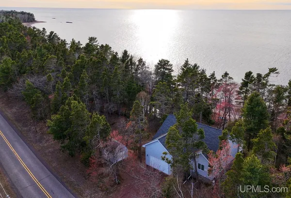$899,500 | 5877 5 Mile Pt Road, Allouez, MI 49805