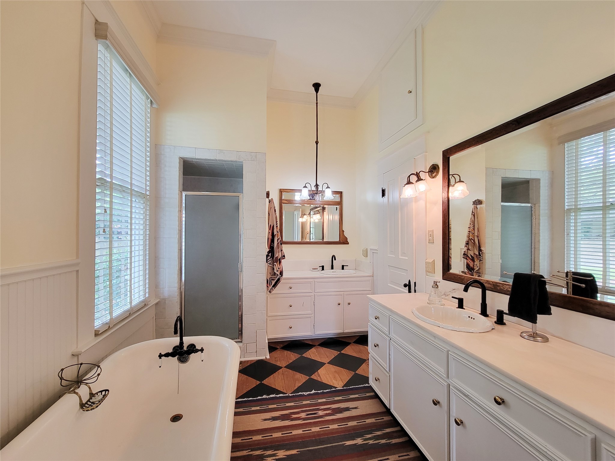 1406 Key Street Brenham, TX 77833 - Photo 21 of 50 a bathroom with a double vanity sink mirror and shower