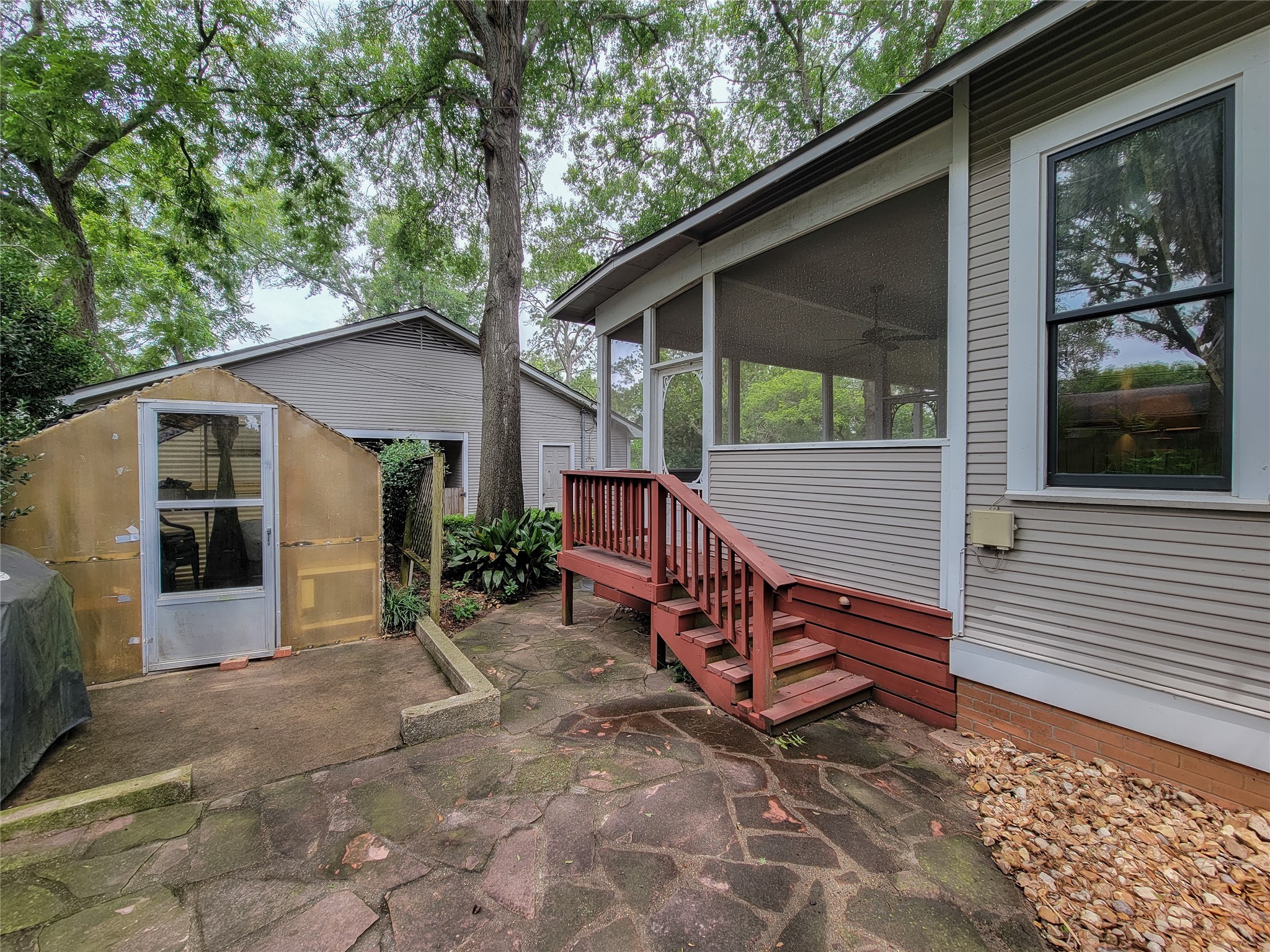 1406 Key Street Brenham, TX 77833 - Photo 34 of 50 a view of a house with backyard and sitting area