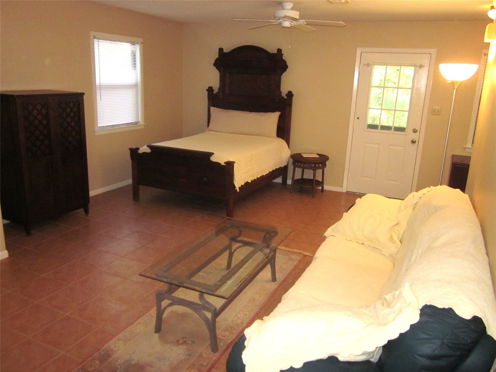1406 Key Street Brenham, TX 77833 - Photo 42 of 50 a bedroom with bed and window
