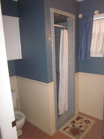 a kitchen with a sink stove and refrigerator