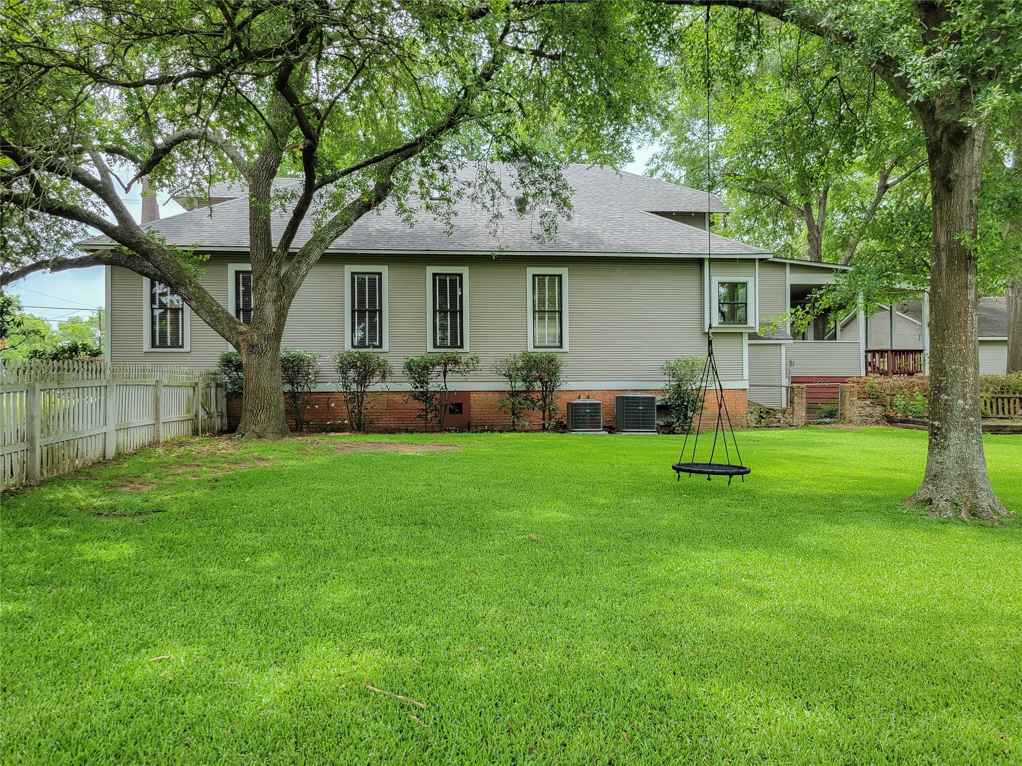 1406 Key Street Brenham, TX 77833 - Photo 5 of 50 a front view of house with yard and green space