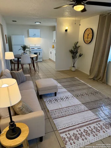 a living room with a couch and a table