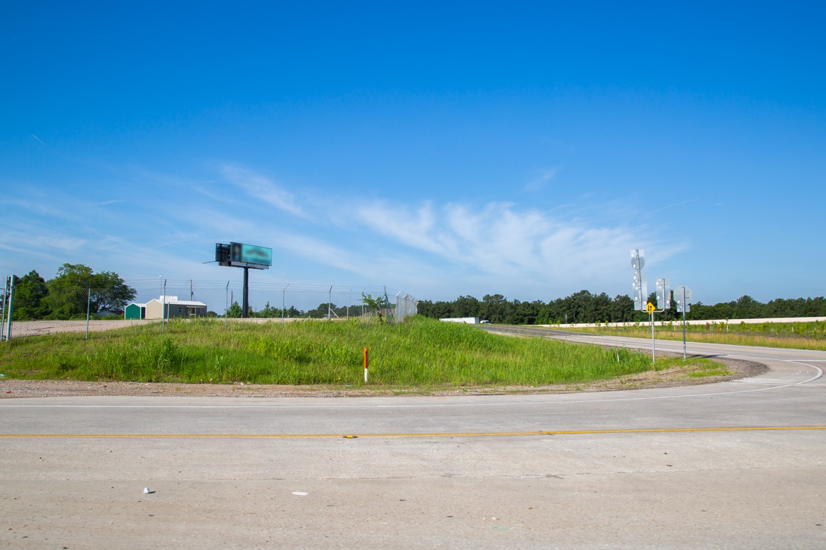 0 North I-45 N Service Road New Waverly, TX 77358 - Photo 6 of 11 a view of a golf course with a lake view