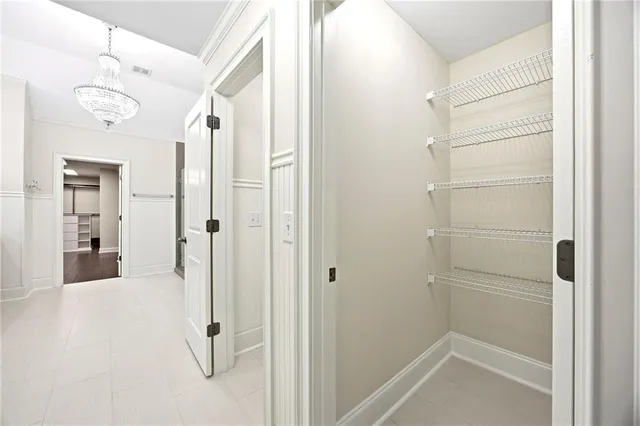 a spacious bathroom with a granite countertop sink mirror and shower
