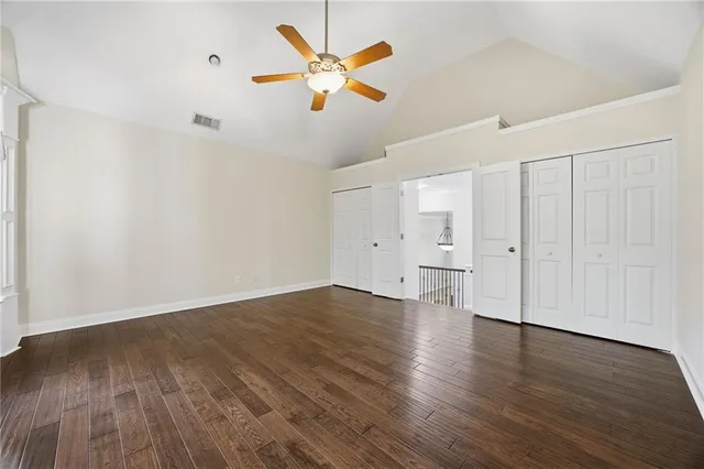 a living room with furniture a fireplace and a window