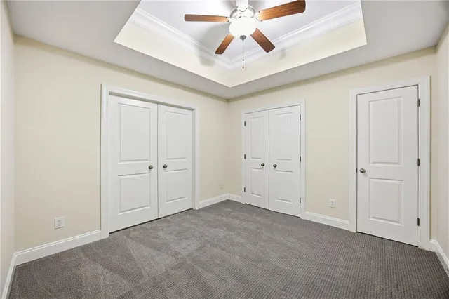 a bathroom with a sink a mirror and a window