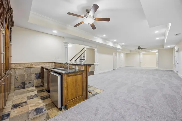 a view of a porch with wooden floor