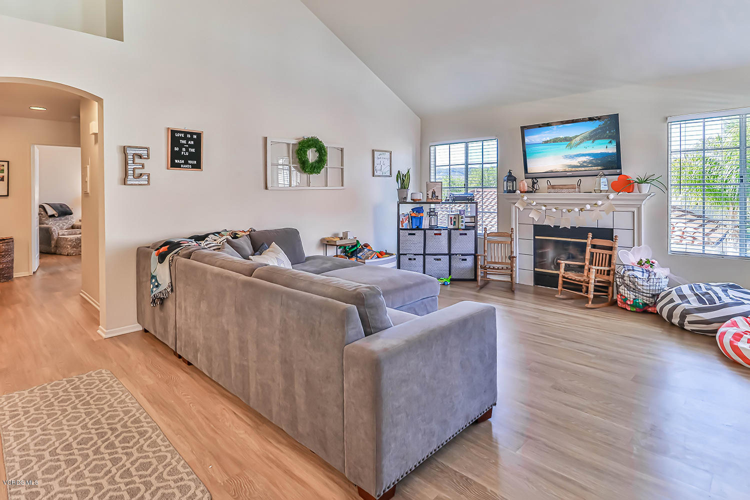 610 Geranium Lane, Unit A Simi Valley, CA 93065 - Photo 6 of 26 a living room with furniture and a fireplace