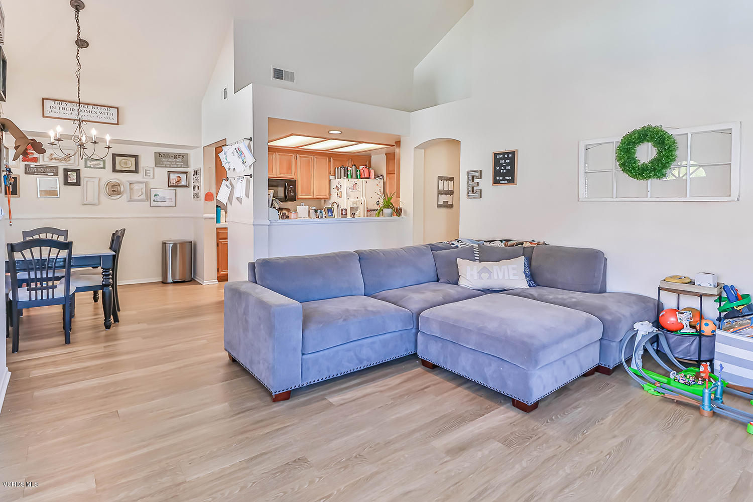 610 Geranium Lane, Unit A Simi Valley, CA 93065 - Photo 7 of 26 a living room with furniture and a wooden floor