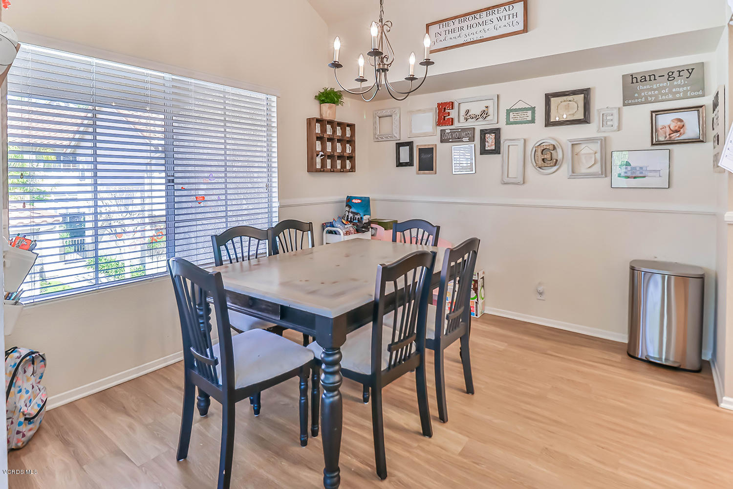 610 Geranium Lane, Unit A Simi Valley, CA 93065 - Photo 8 of 26 a view of a dining room with furniture and wooden floor
