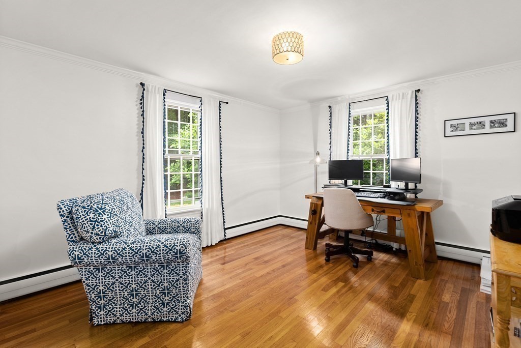 49 Sears Road Wayland, MA 01778 - Photo 19 of 30 a living room with furniture and a wooden floor