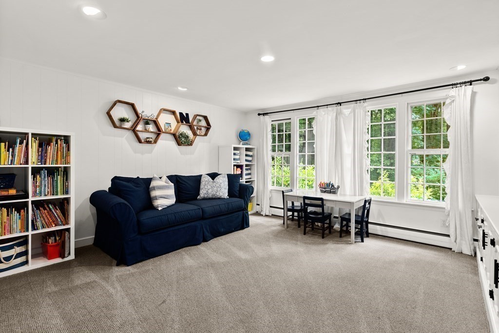 49 Sears Road Wayland, MA 01778 - Photo 20 of 30 a living room with furniture and a large window
