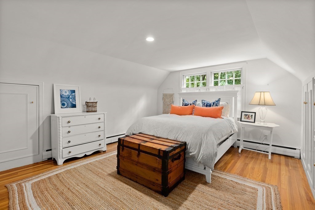 49 Sears Road Wayland, MA 01778 - Photo 22 of 30 a bedroom with a bed and a dresser