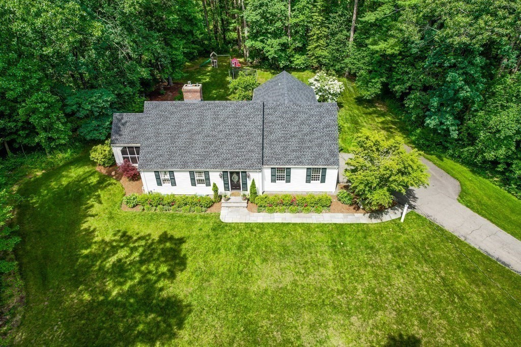 49 Sears Road Wayland, MA 01778 - Photo 29 of 30 a aerial view of a house next to a big yard and large trees