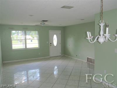 20 Colorado Road Lehigh Acres, FL 33936 - Photo 2 of 10 a view of a livingroom with window