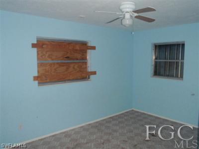 20 Colorado Road Lehigh Acres, FL 33936 - Photo 5 of 10 an empty room with closet