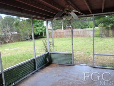 20 Colorado Road Lehigh Acres, FL 33936 - Photo 9 of 10 a view of backyard with green space