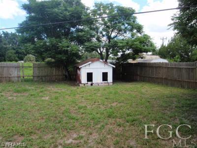 20 Colorado Road Lehigh Acres, FL 33936 - Photo 10 of 10 a house view with a garden space