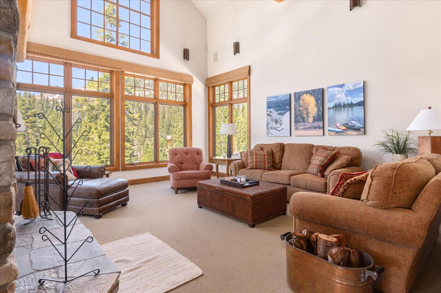 110 Flynn Road Bear Valley, CA 95223 - Photo 11 of 56 a living room with furniture and a large window