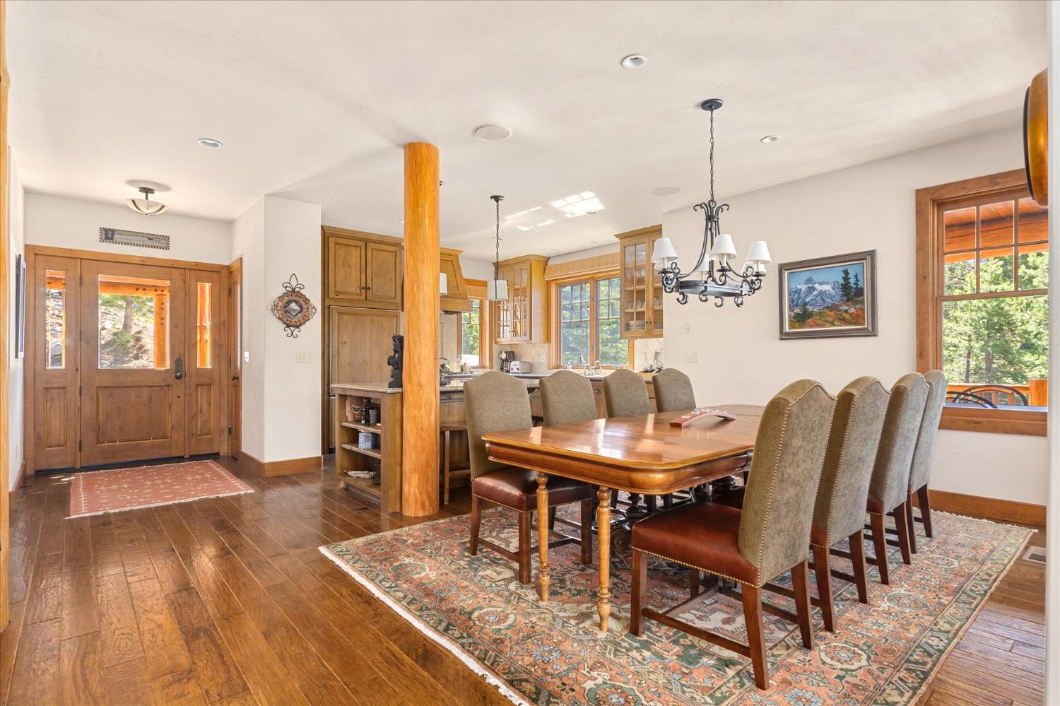 110 Flynn Road Bear Valley, CA 95223 - Photo 13 of 56 a view of a dining room with furniture window and wooden floor