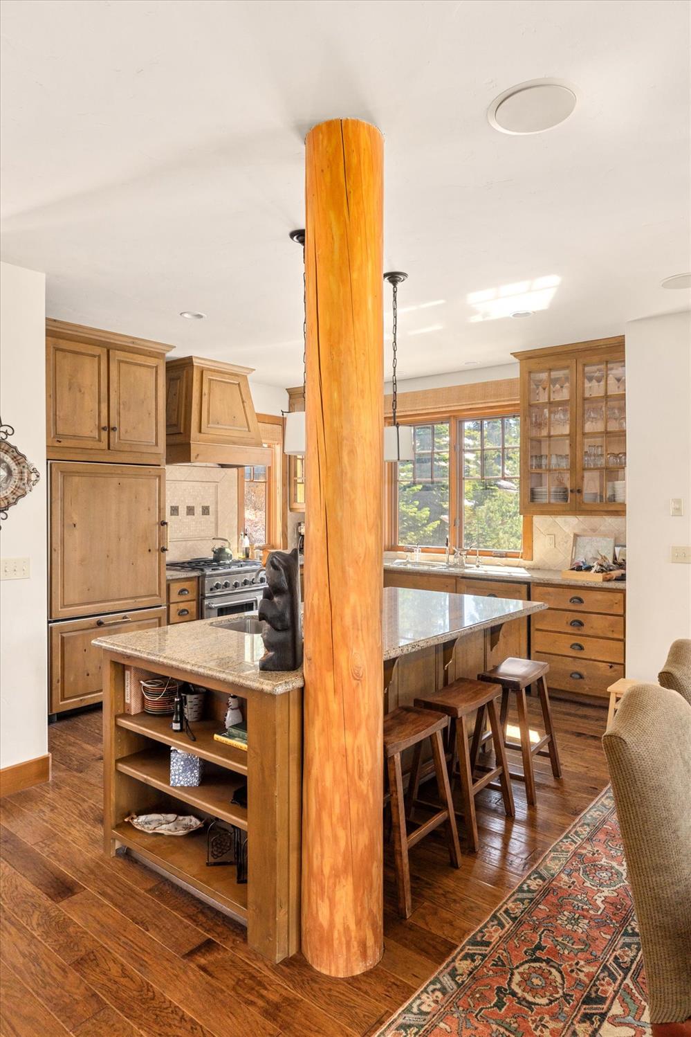 110 Flynn Road Bear Valley, CA 95223 - Photo 16 of 56 a view of a dining room with furniture window and wooden floor