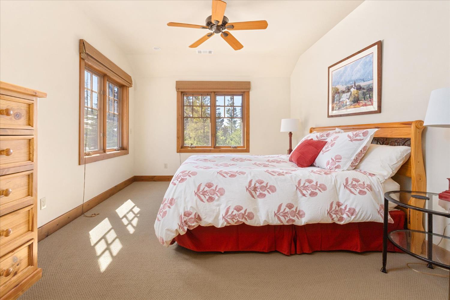 110 Flynn Road Bear Valley, CA 95223 - Photo 23 of 56 a bedroom with a bed and wooden floor
