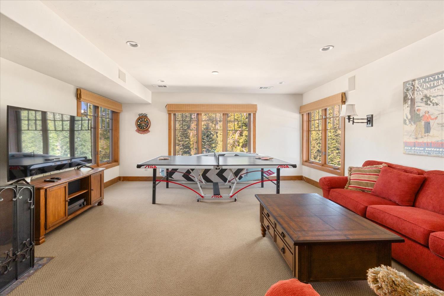 110 Flynn Road Bear Valley, CA 95223 - Photo 32 of 56 a living room with furniture and a large window