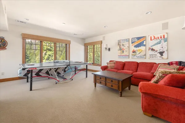 a bedroom with bed and window
