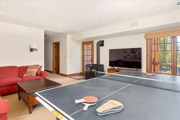 a bedroom with a bed and a cabinets