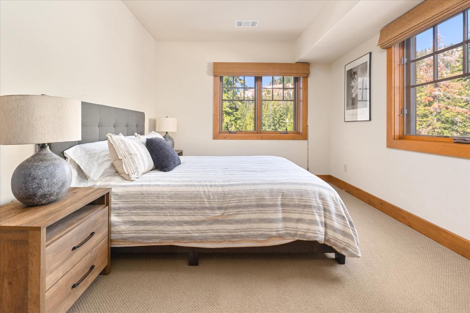 110 Flynn Road Bear Valley, CA 95223 - Photo 35 of 56 a bedroom with a bed and a window