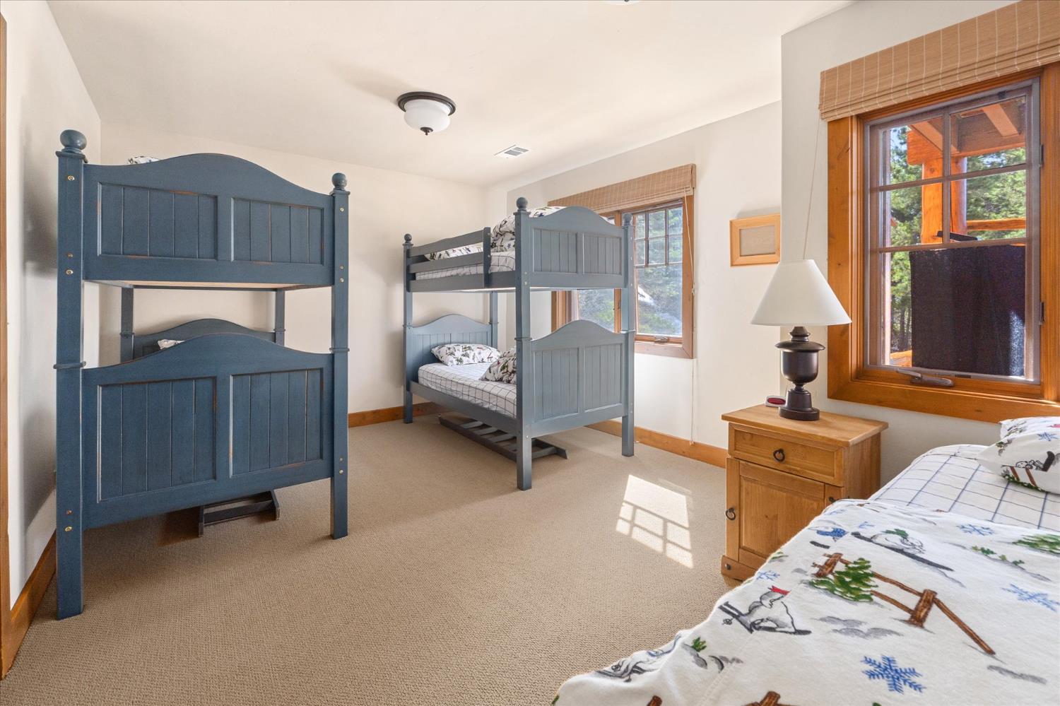 110 Flynn Road Bear Valley, CA 95223 - Photo 36 of 56 a bedroom with bed and window