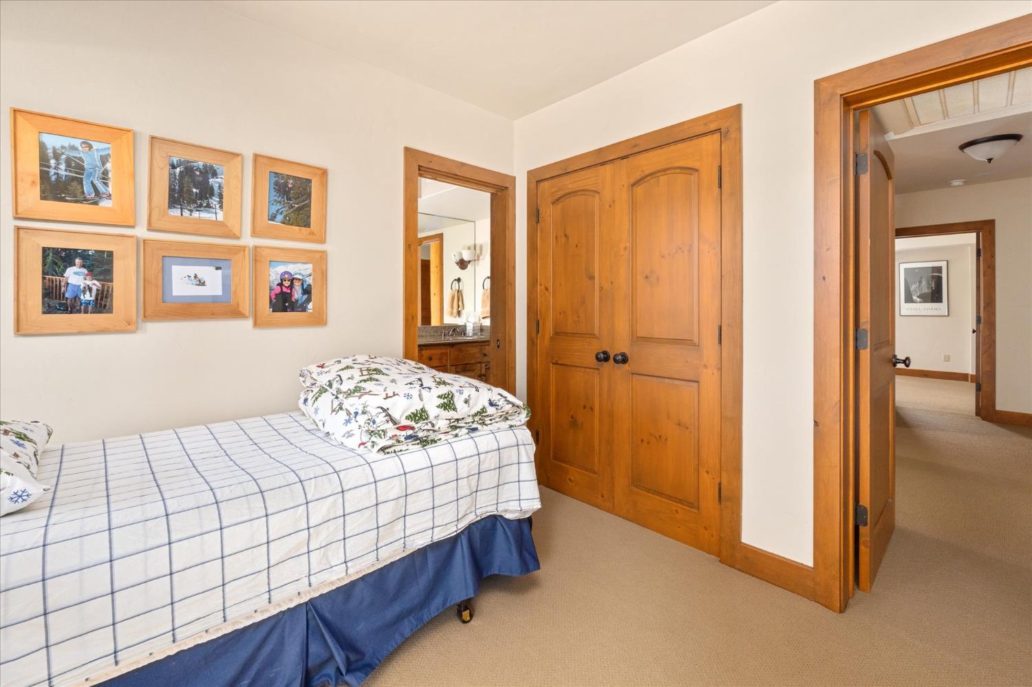 110 Flynn Road Bear Valley, CA 95223 - Photo 37 of 56 a bedroom with a bed and a cabinets